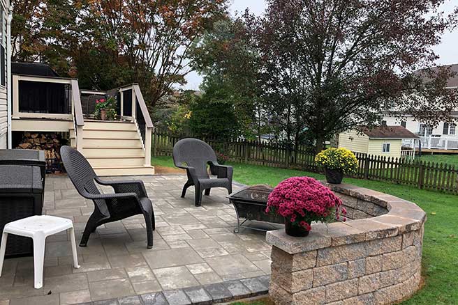 Stone patio with partial wall