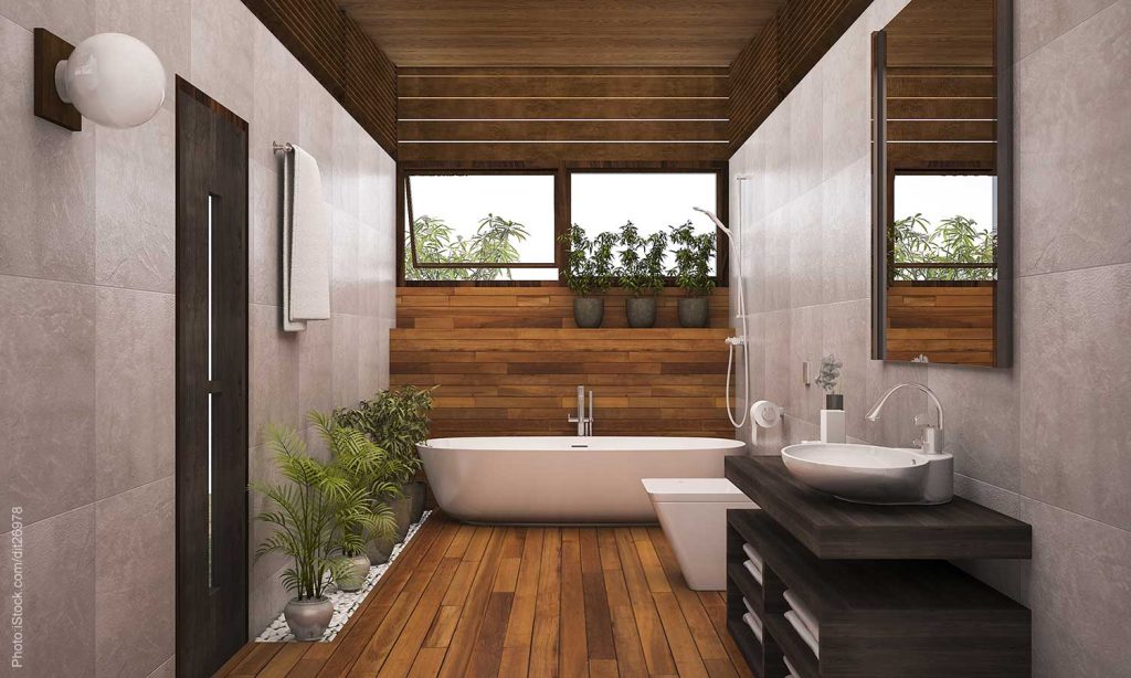Wood on ceiling, accent wall, and floor of this luxury bathroom