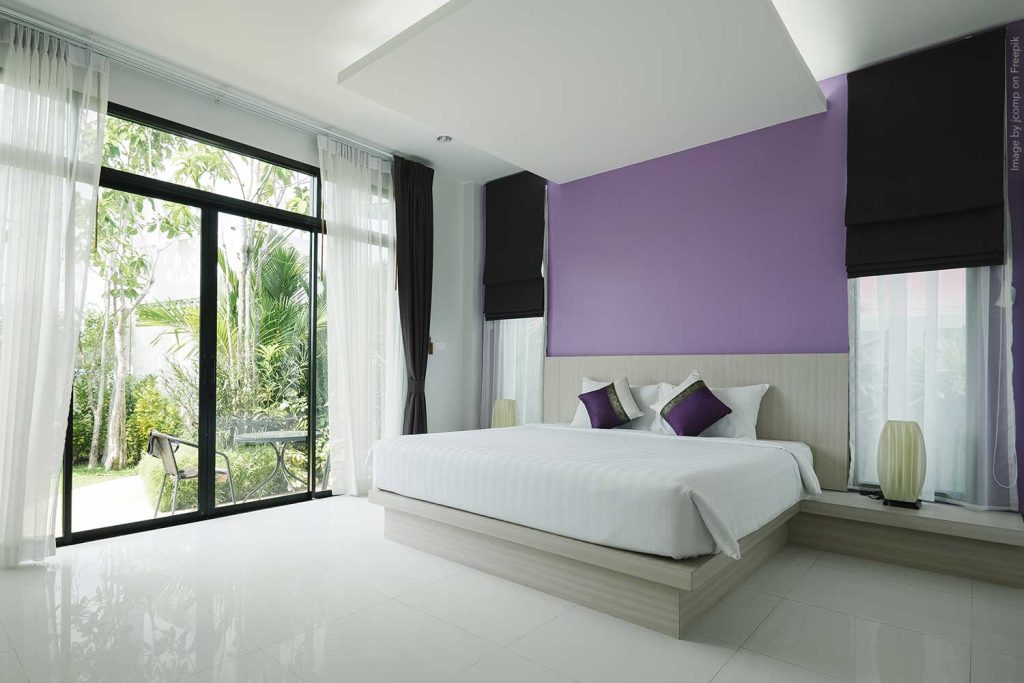 Luxury bedroom upgrade with large tile flooring