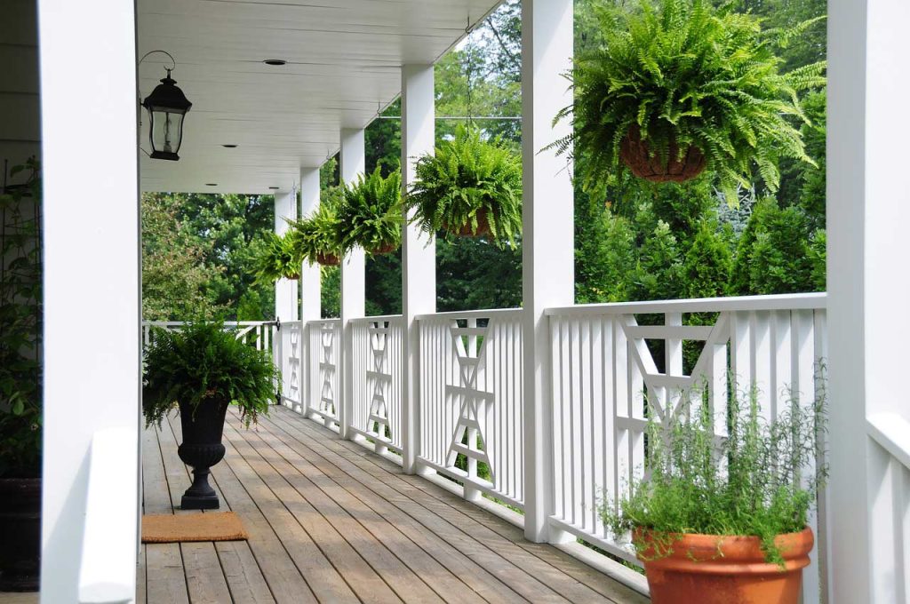 A front porch can be an excellent outdoor space for all weather