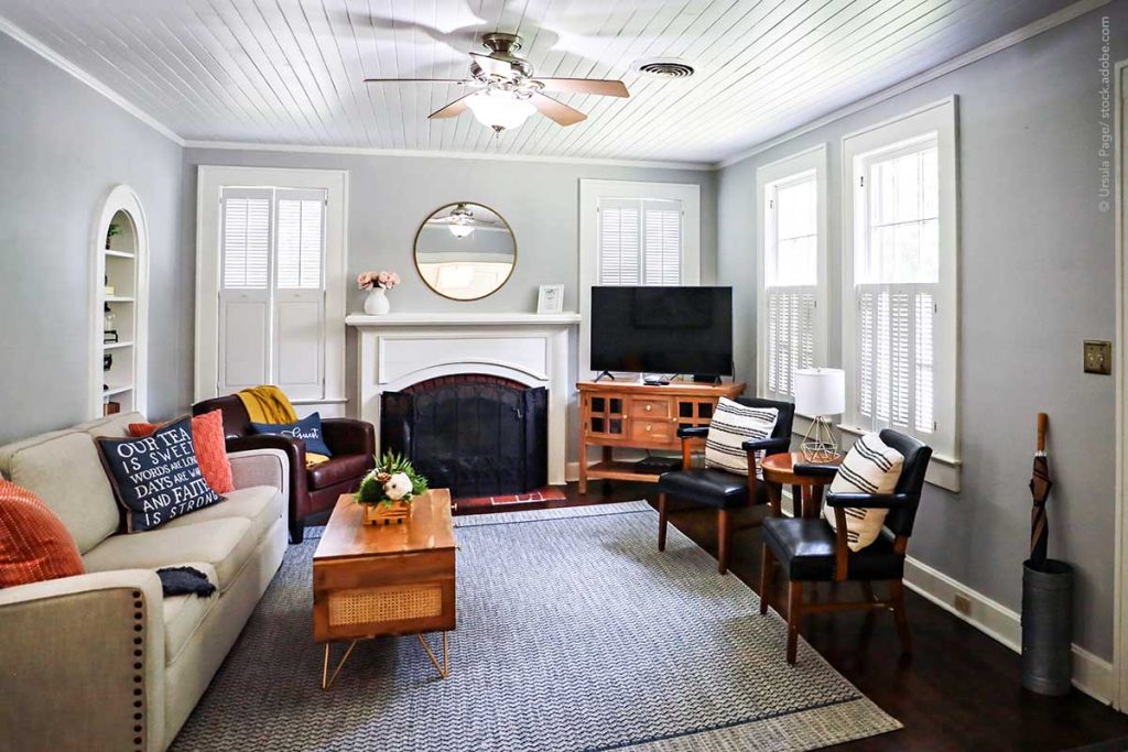 A clean and classic airy living room of a small cottage short term rental.