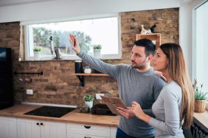 a first step in planning your remodel, this couple is discussing possiblities